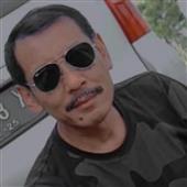 NĂ