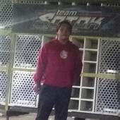 Qu